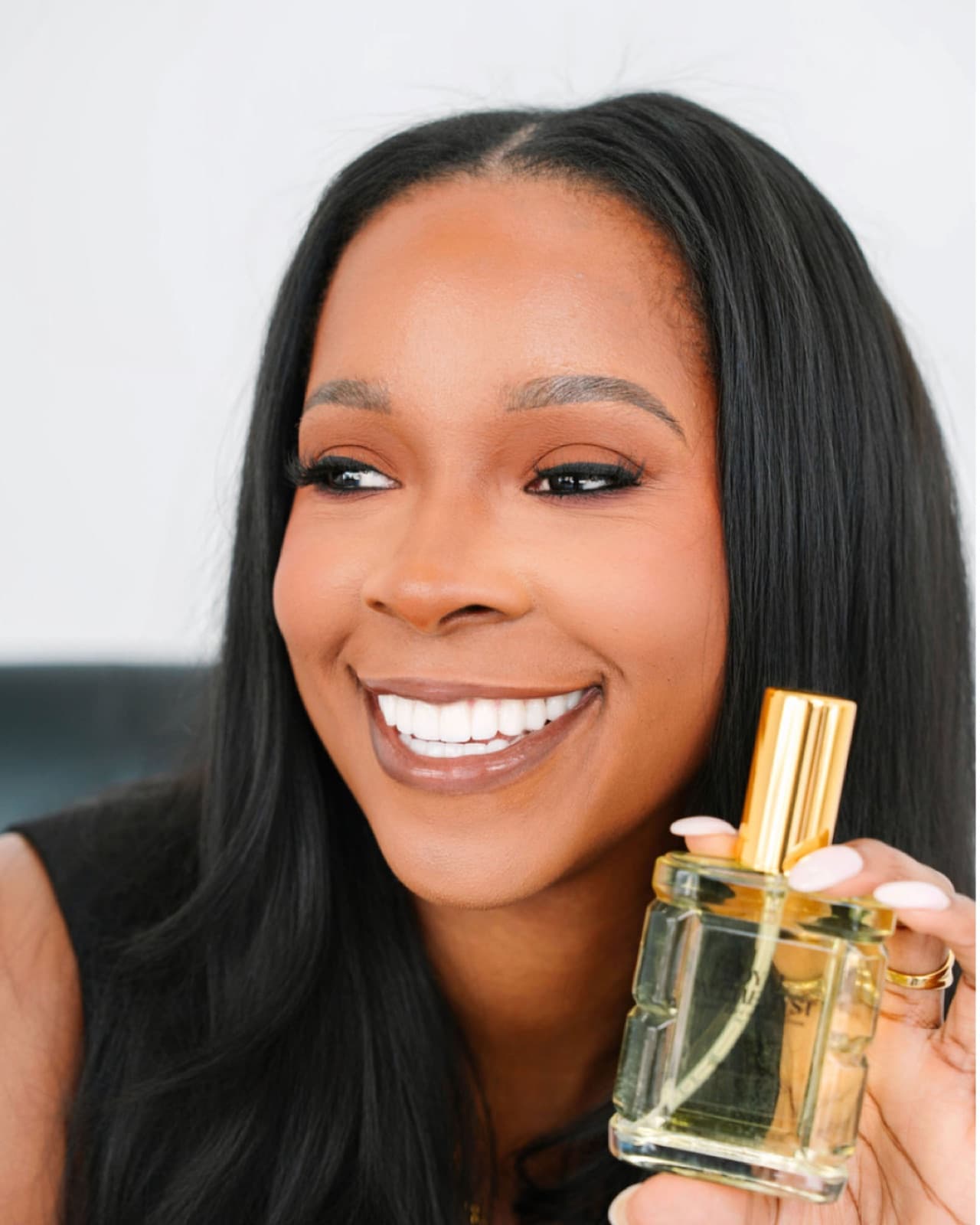 Christin Bradley, founder of Royal Alchemyst, smiling